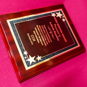 Brass Plate on wine red plaque